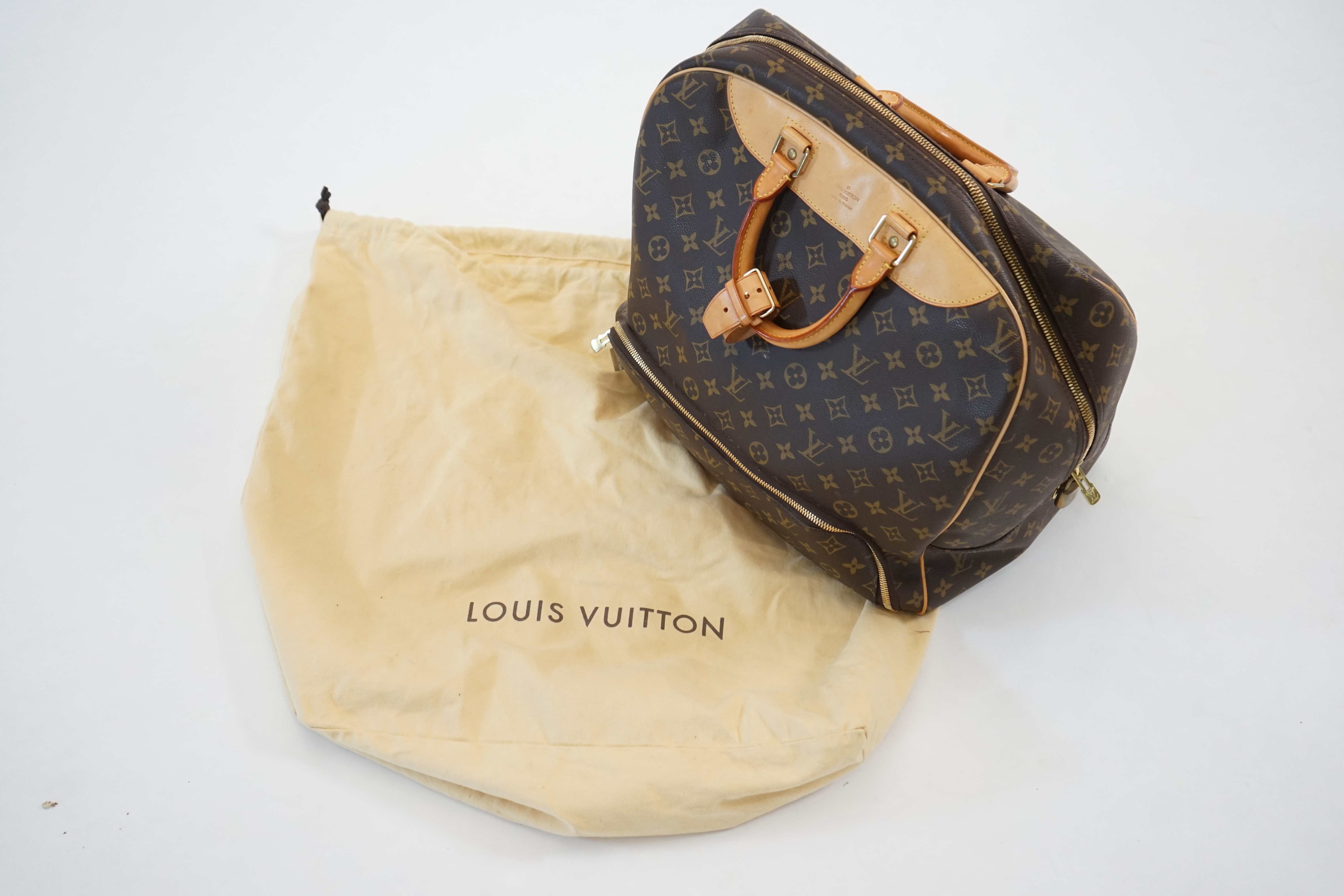 A Louis Vuitton Evasion travel bag width 38cm, depth 23cm, length 33cm, hand drop 12cm